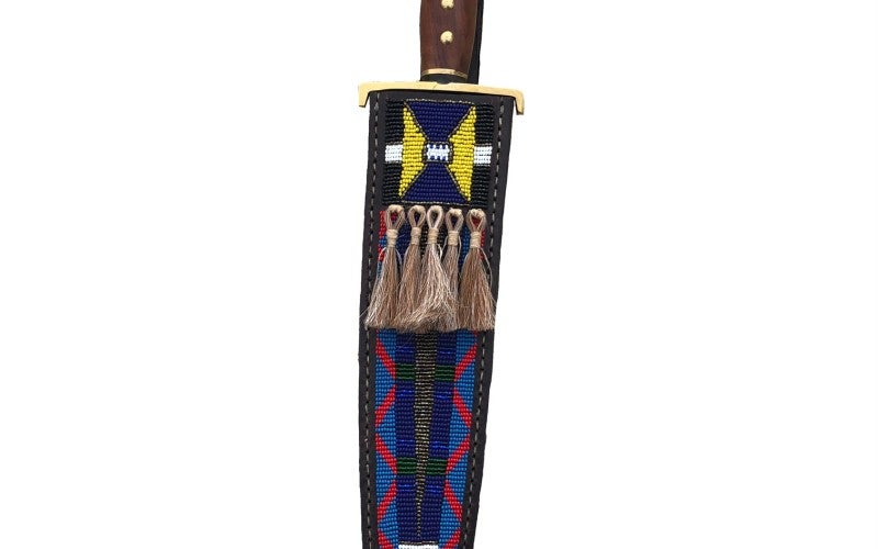 Plateau Knife and Sheath, "toothpick style", knife sheath is fully beaded and has horse hair attached.